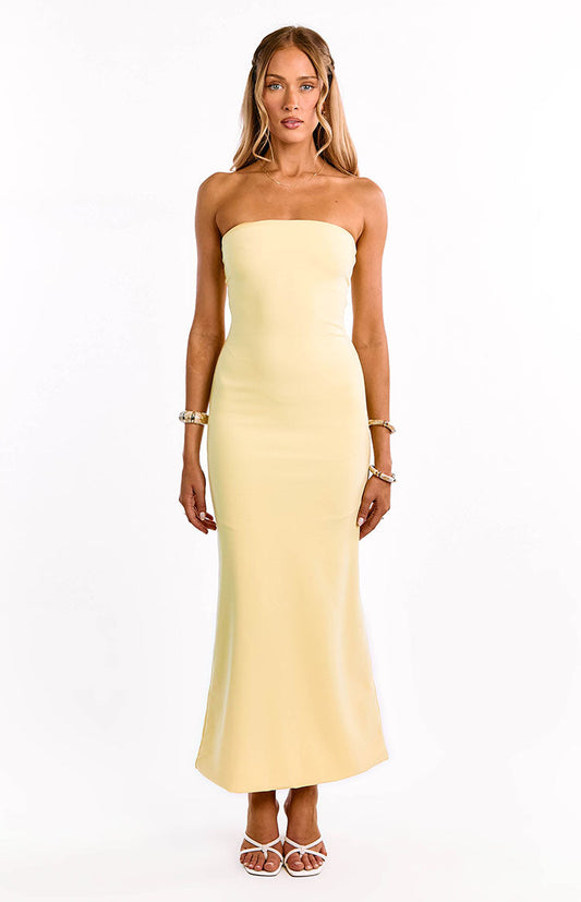 Yellow crepe maxi dress with a bandeau neckline, fitted through the body and flaring gently at the hem