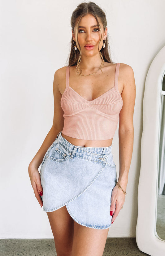 Knitted pink cami top on model Belle Lucia.