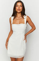 White summer sleeveless mini dress with side tie.