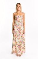 Yellow satin maxi dress with an all-over pink and orange floral print, featuring thin spaghetti straps and a criss-cross lace-up back detail.