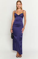 brunette model wearing a navy maxi dress holding a black handbag beside a blonde model wearing a black maxi dress