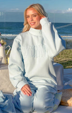 Remy Blue Applique Mock Neck Sweater Image
